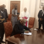 Boakai Signs Book of Condolences For Pope Francis