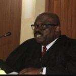 Judge Denies Prosecution’s Bid to Add Defendant